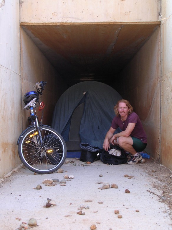 Greece: with no other places to sleep we ended up camping in a storm drain where wild dogs barked at us all night. The echo was deafening.